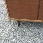 Vintage walnut varnished chest of drawers with 4 drawers from the 1960s.