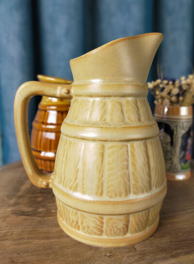 Two pitchers and a small original king beer mug