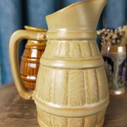 Two pitchers and a small original king beer mug