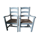 2 armchairs by the fireplace