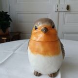 Covered jar jar jar in the shape of a bird