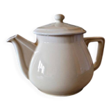 Vintage round ceramic teapot in cream colour, art deco style.