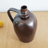 Old Norman bottle in brown ceramic