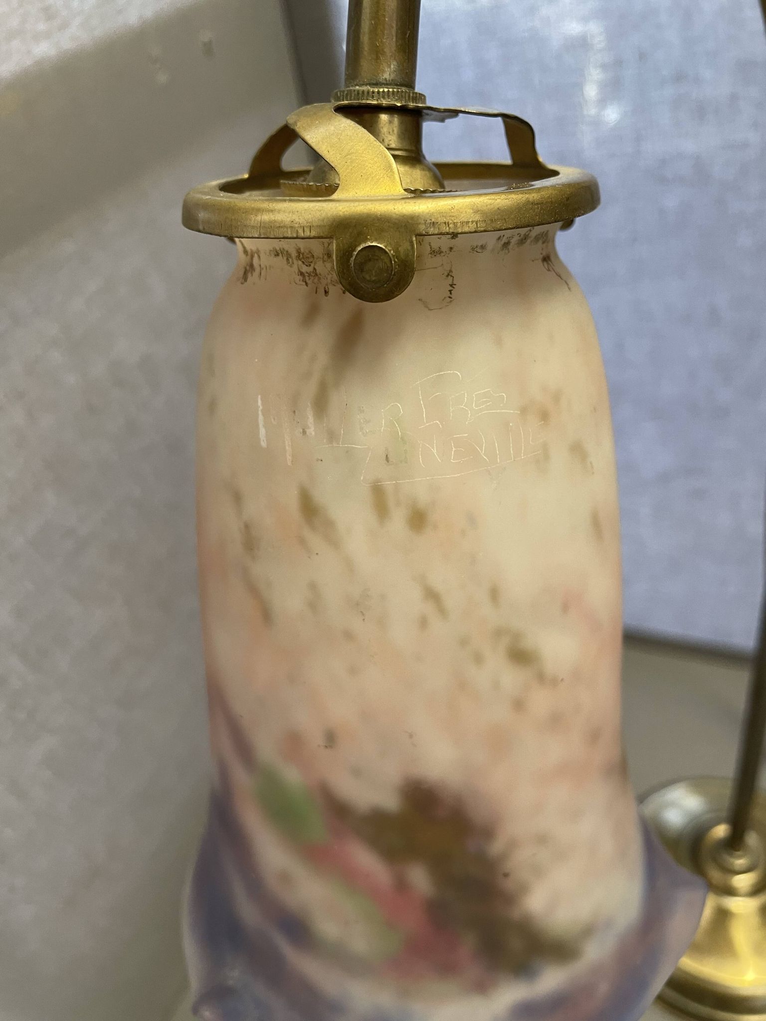 brass lamp that raises and lowers