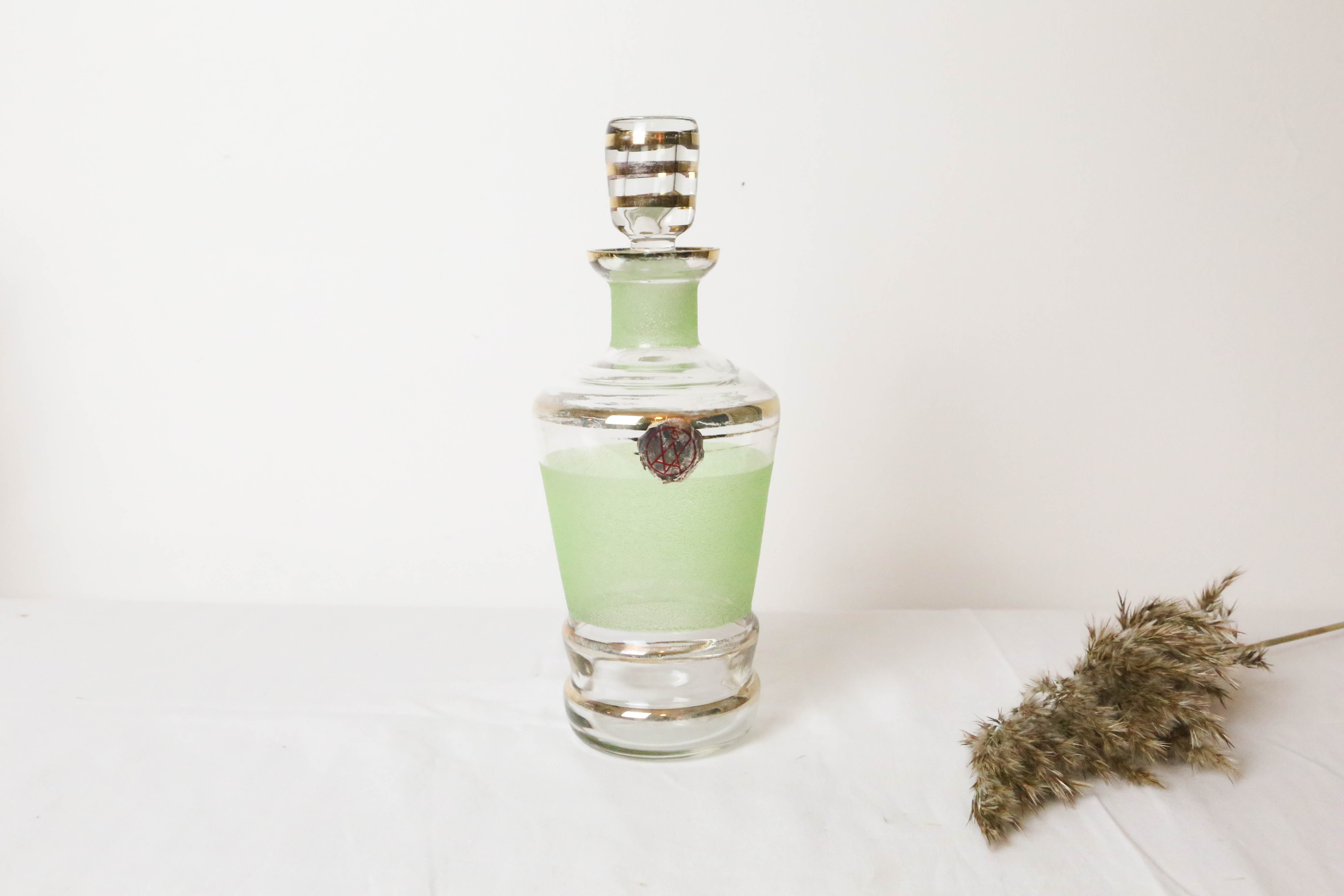 Carafe en verre granité vert, vintage