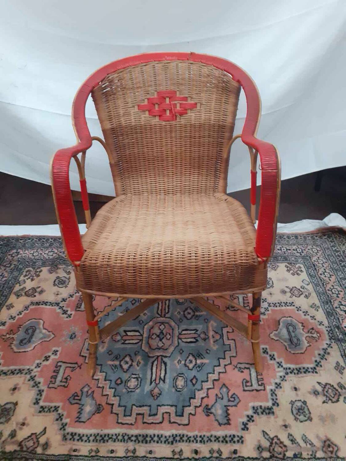 Refurbished wicker armchair