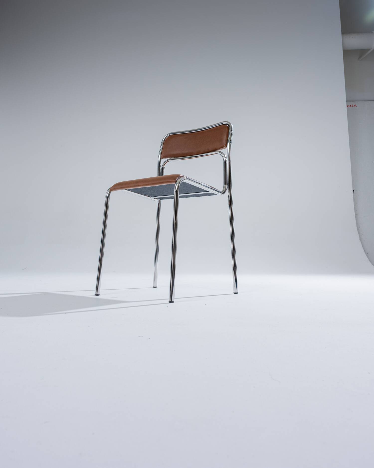 Tubular steel and cognac leatherette chair, 1980s