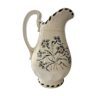 Pitcher in earthenware, relief motifs