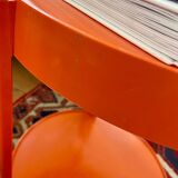 Round orange plastic side table 1970