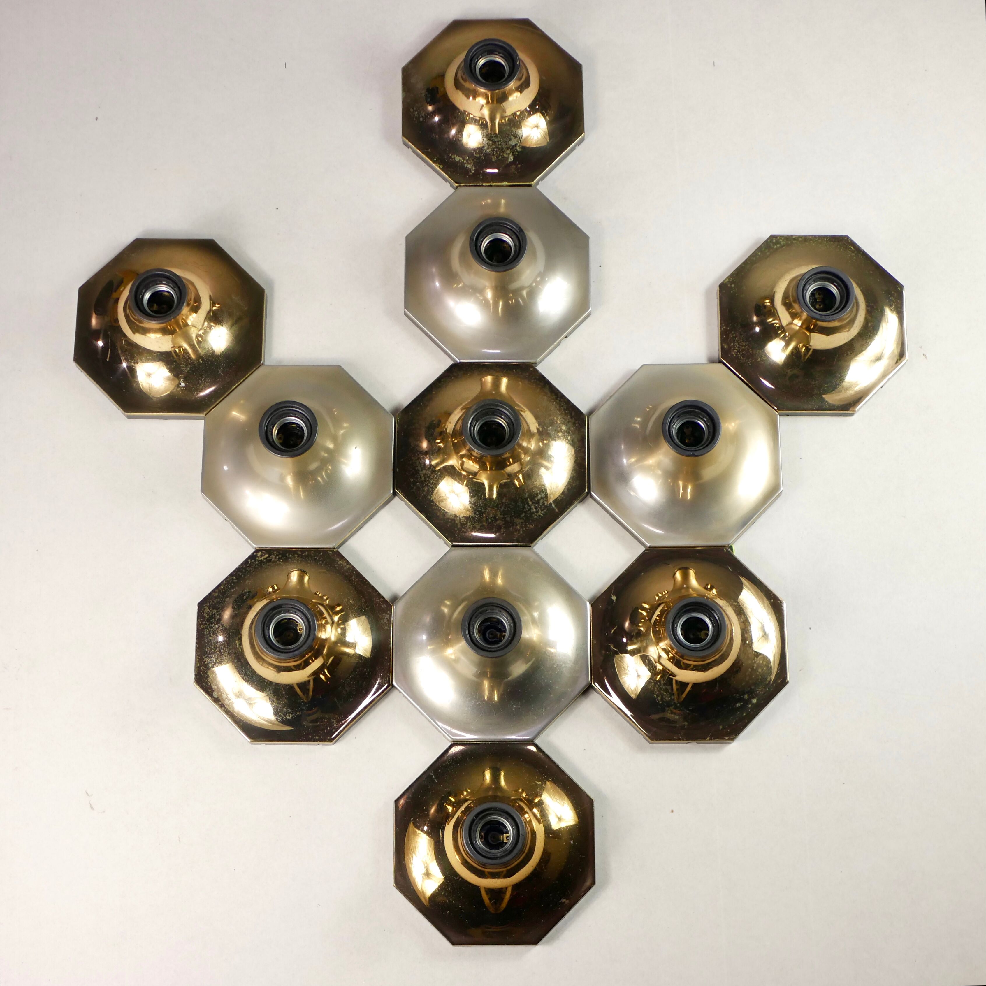 Suite of 11 octagonal brass sconces by Motoko Ishii