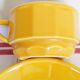 Apilco yellow and white porcelain chocolate cup and saucers