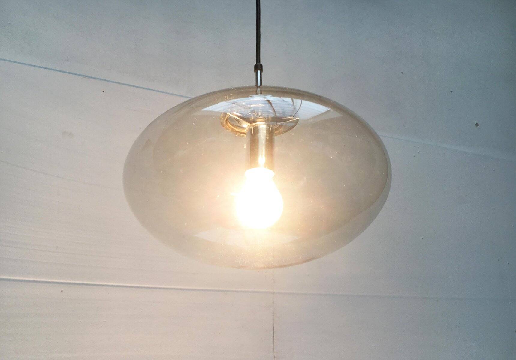 Suspended UFO-shaped glass luminaires in mid-century German Space Age style, set of 3.