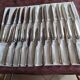Stainless steel knives and silver metal