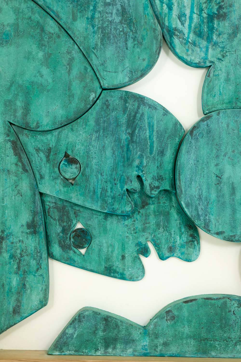 “The Twins”, bas-relief framed in oak wood and patinated copper.