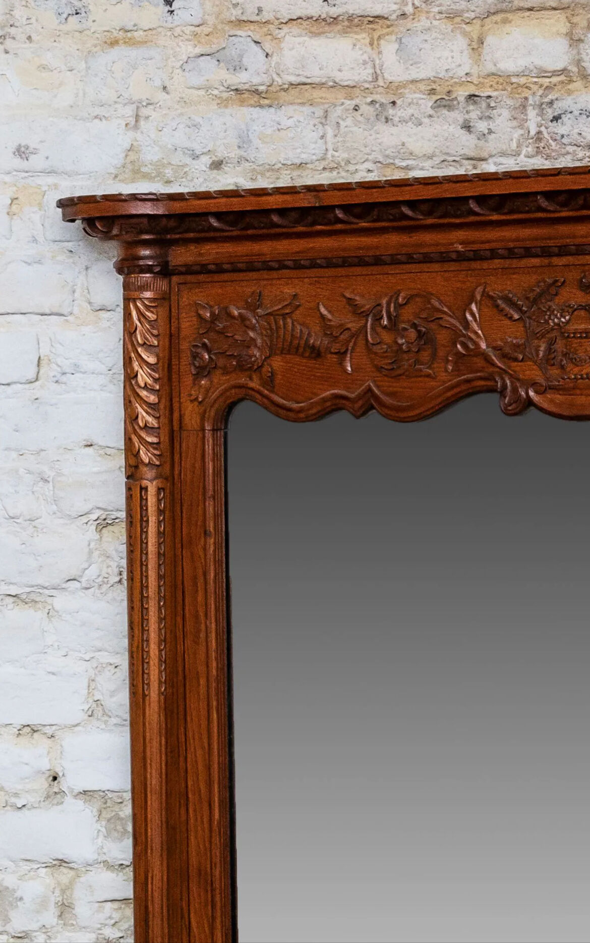Beveled mirror in carved oak early twentieth century
