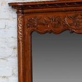 Beveled mirror in carved oak early twentieth century