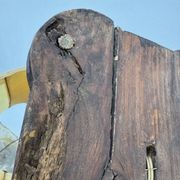 Sculpted wooden lamp with faces, antique.