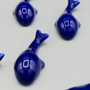 Set of 6 vintage blue porcelain whale knife rests.