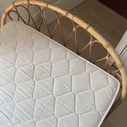 Vintage rattan basket bed