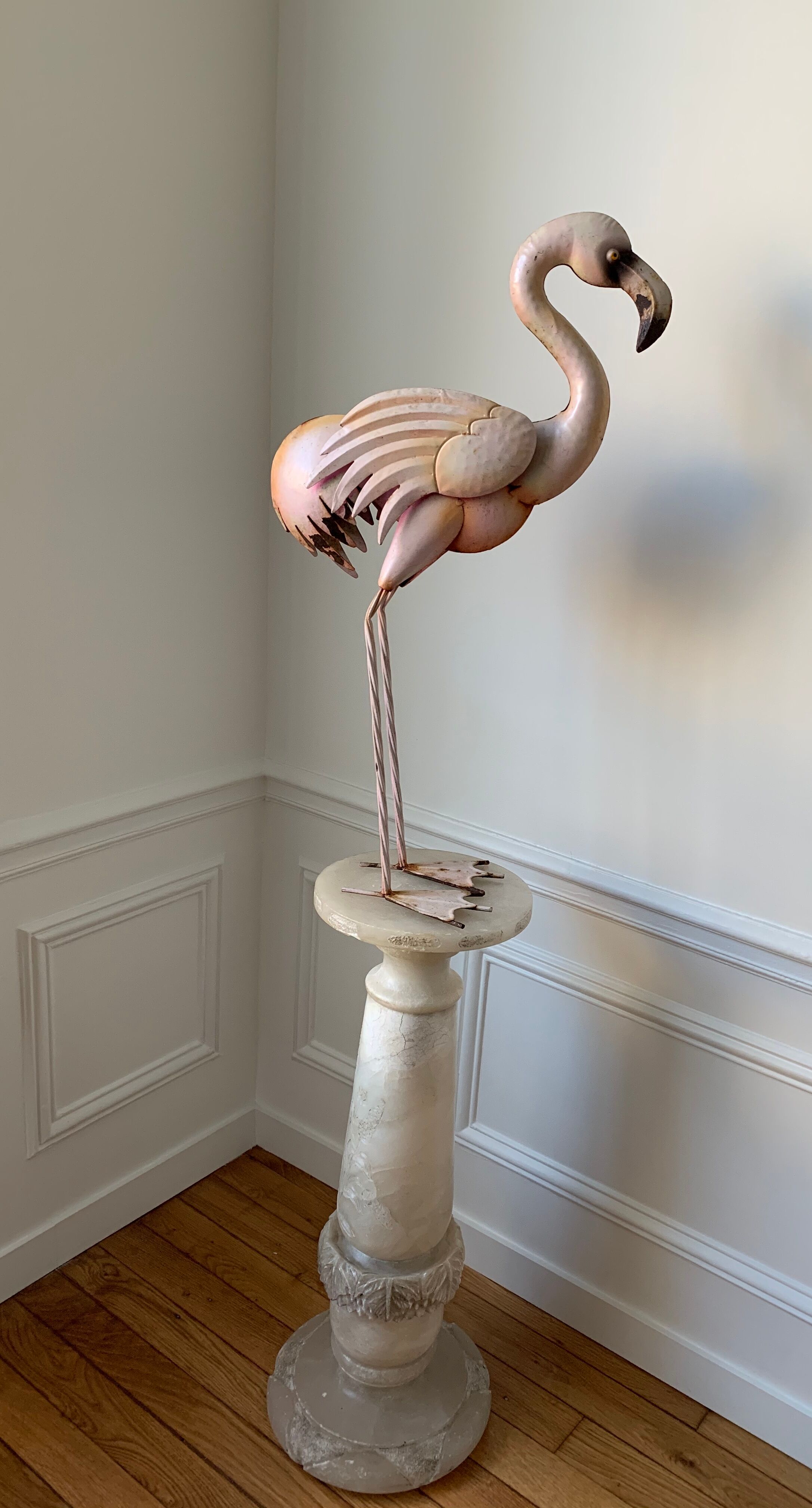 Old decorative pink flame in painted metal