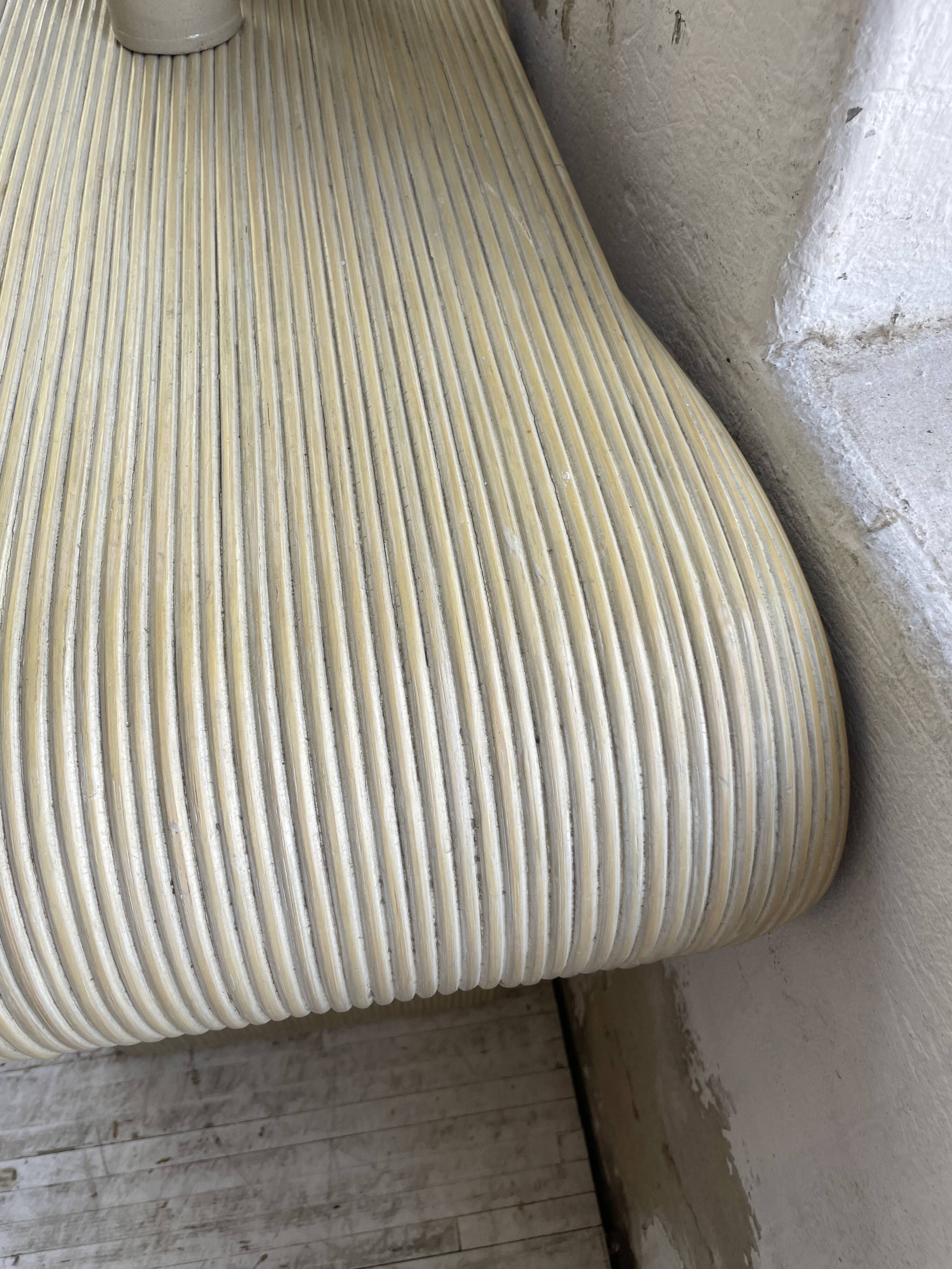 70s console in tropicalist rattan