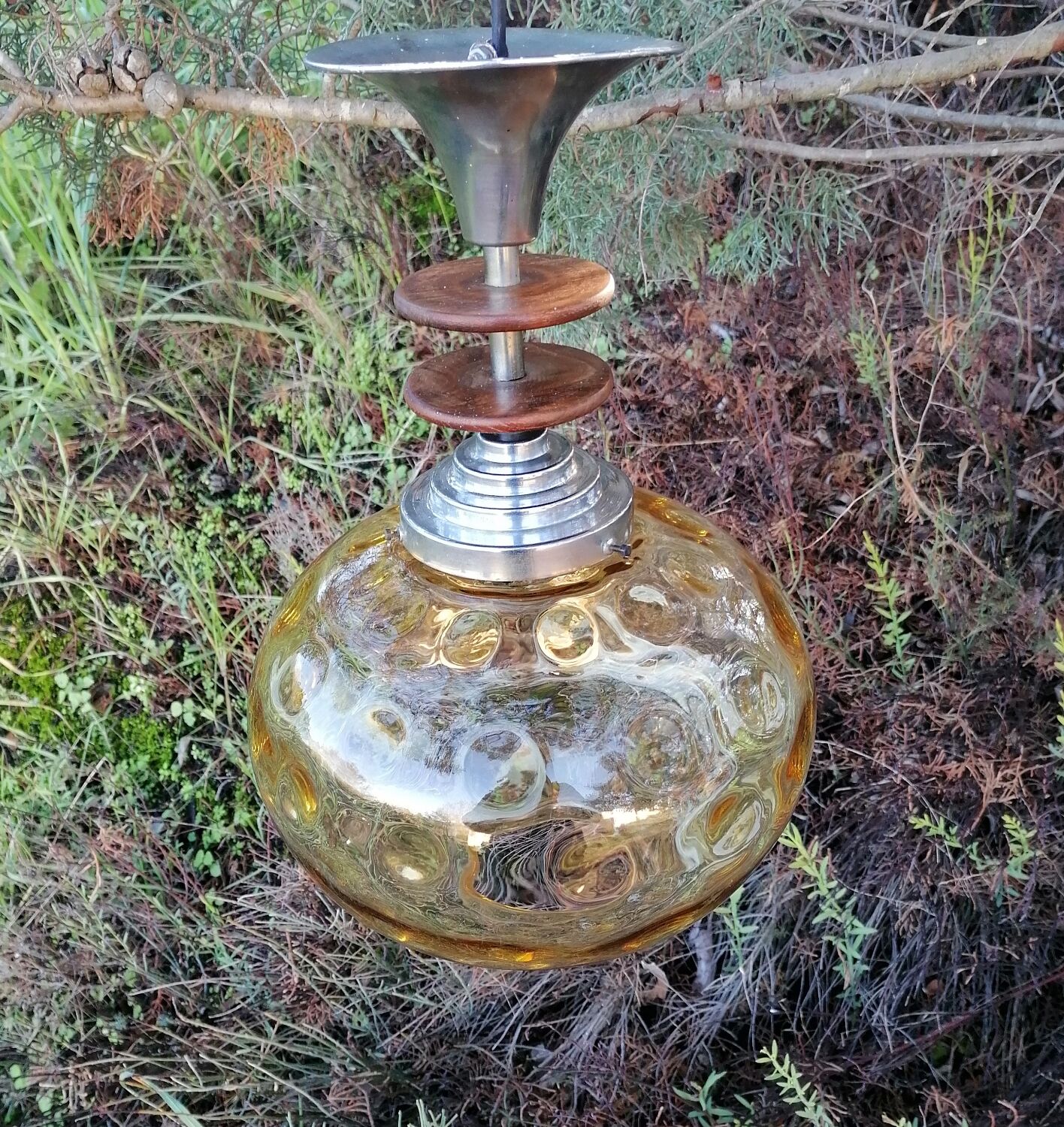 Vintage suspension ball in amber glass