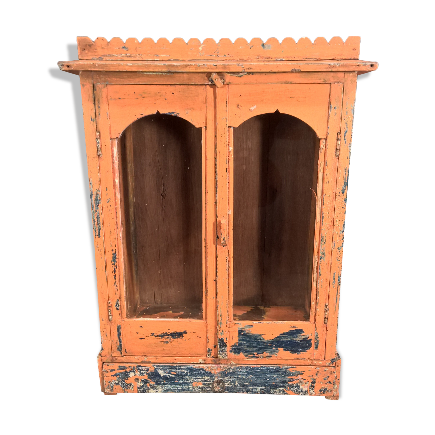 Old temple-showcase with teak offerings