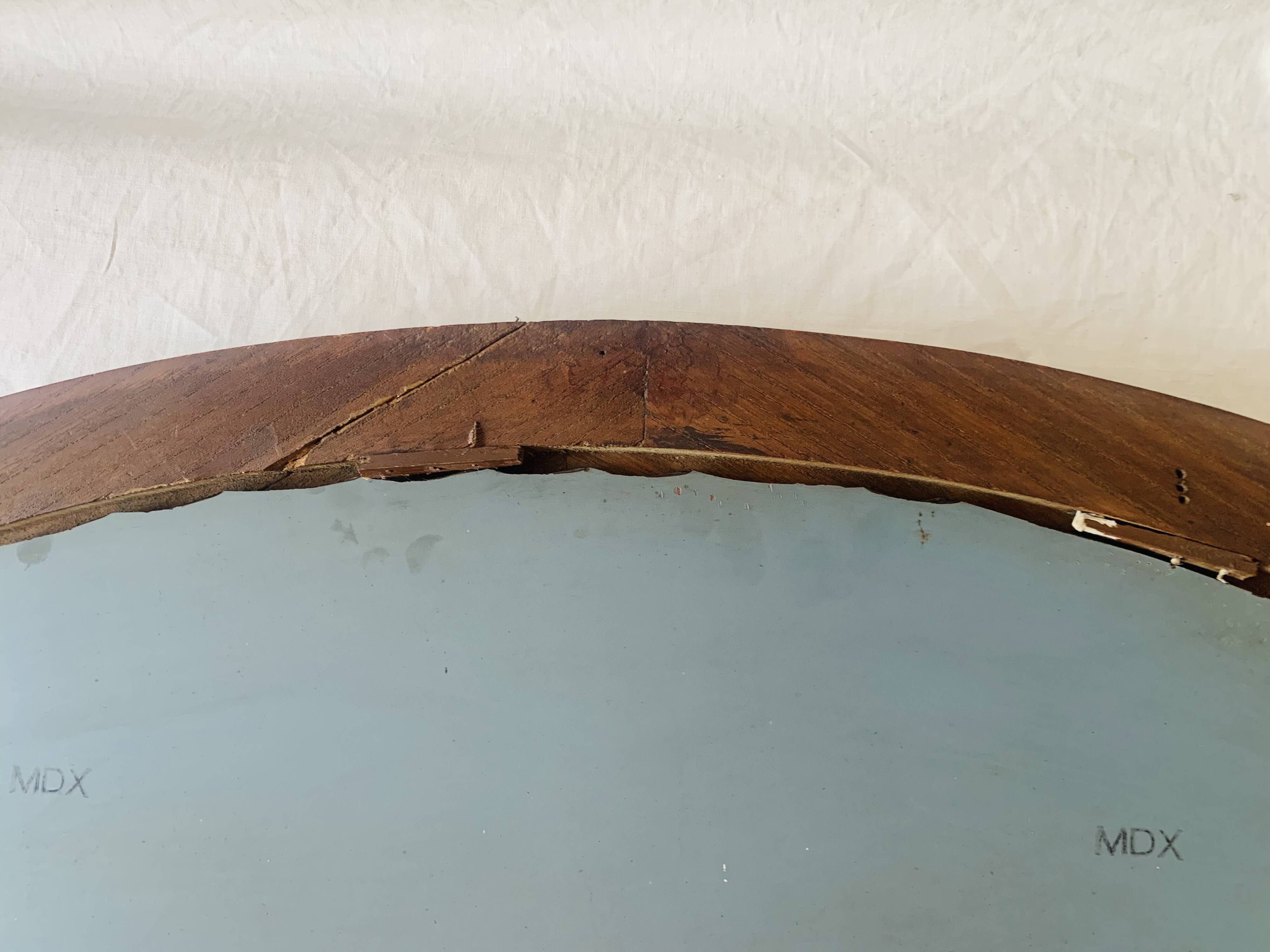 Large Art Deco oval mirror in carved wood - 87 x 53 cm