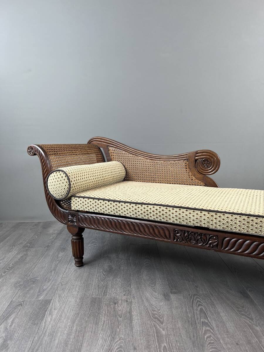Louis XVI style meridian in carved wood and caning, 19th century.