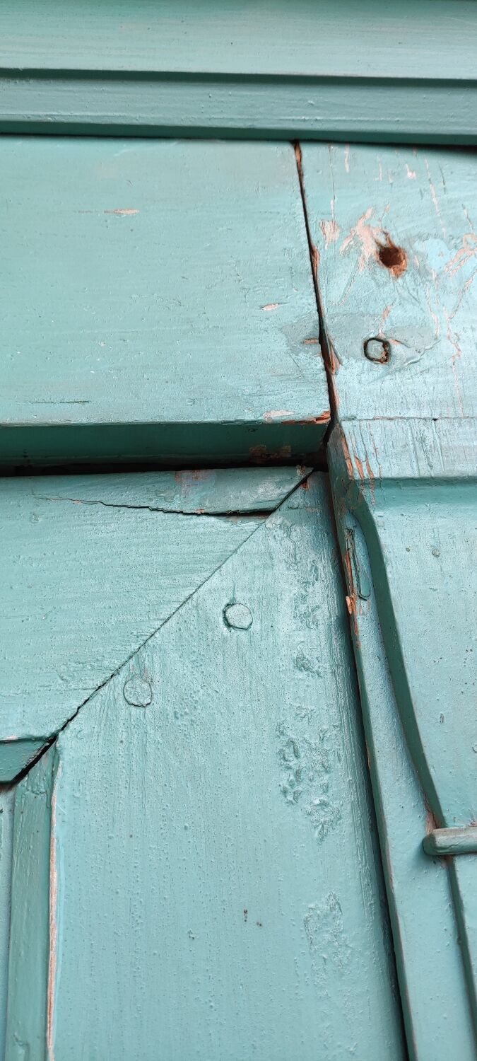 Antique patinated two-door cabinet