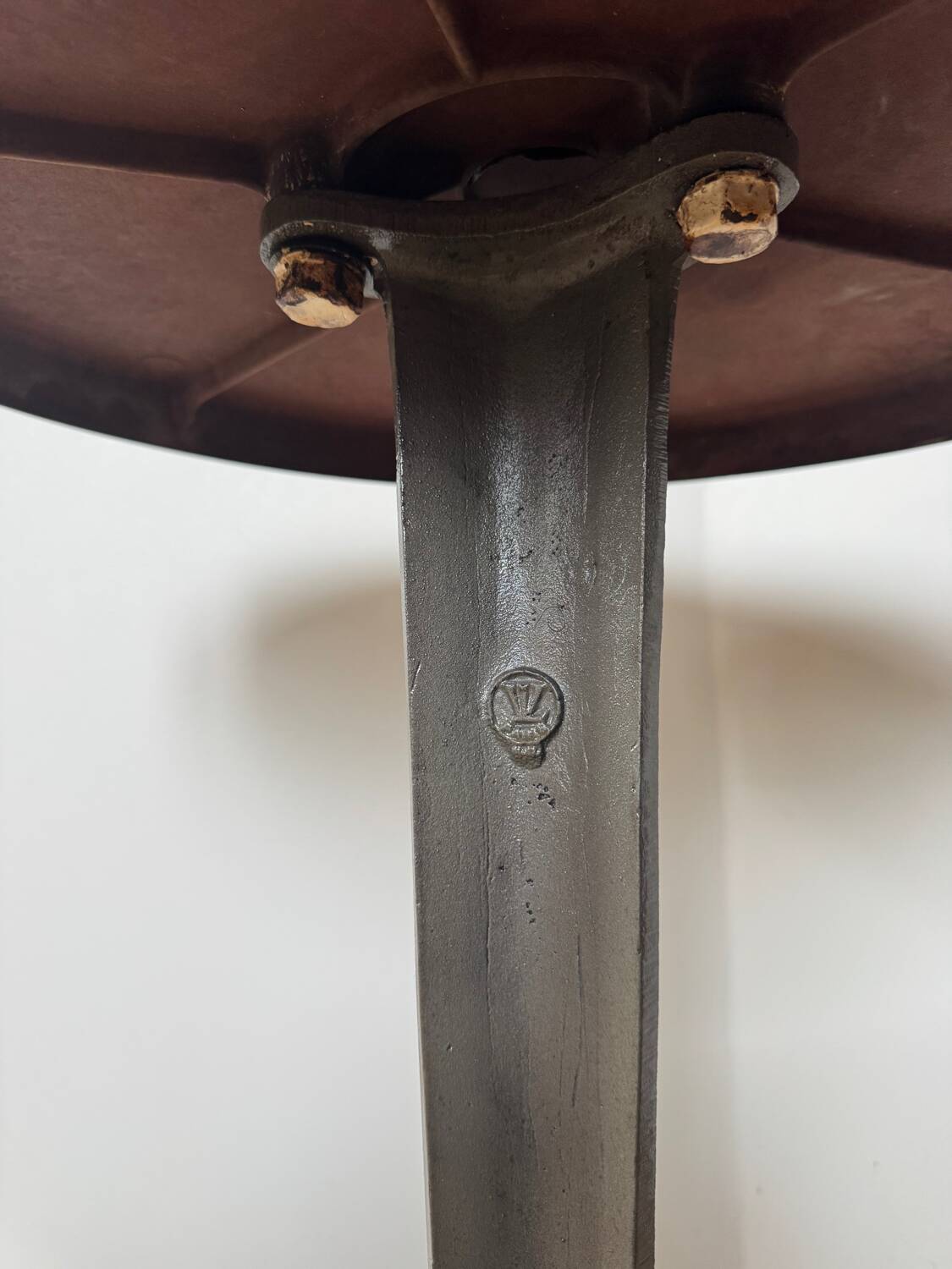 Rare Louis Vuitton cast iron bistro table with a bakelite top.