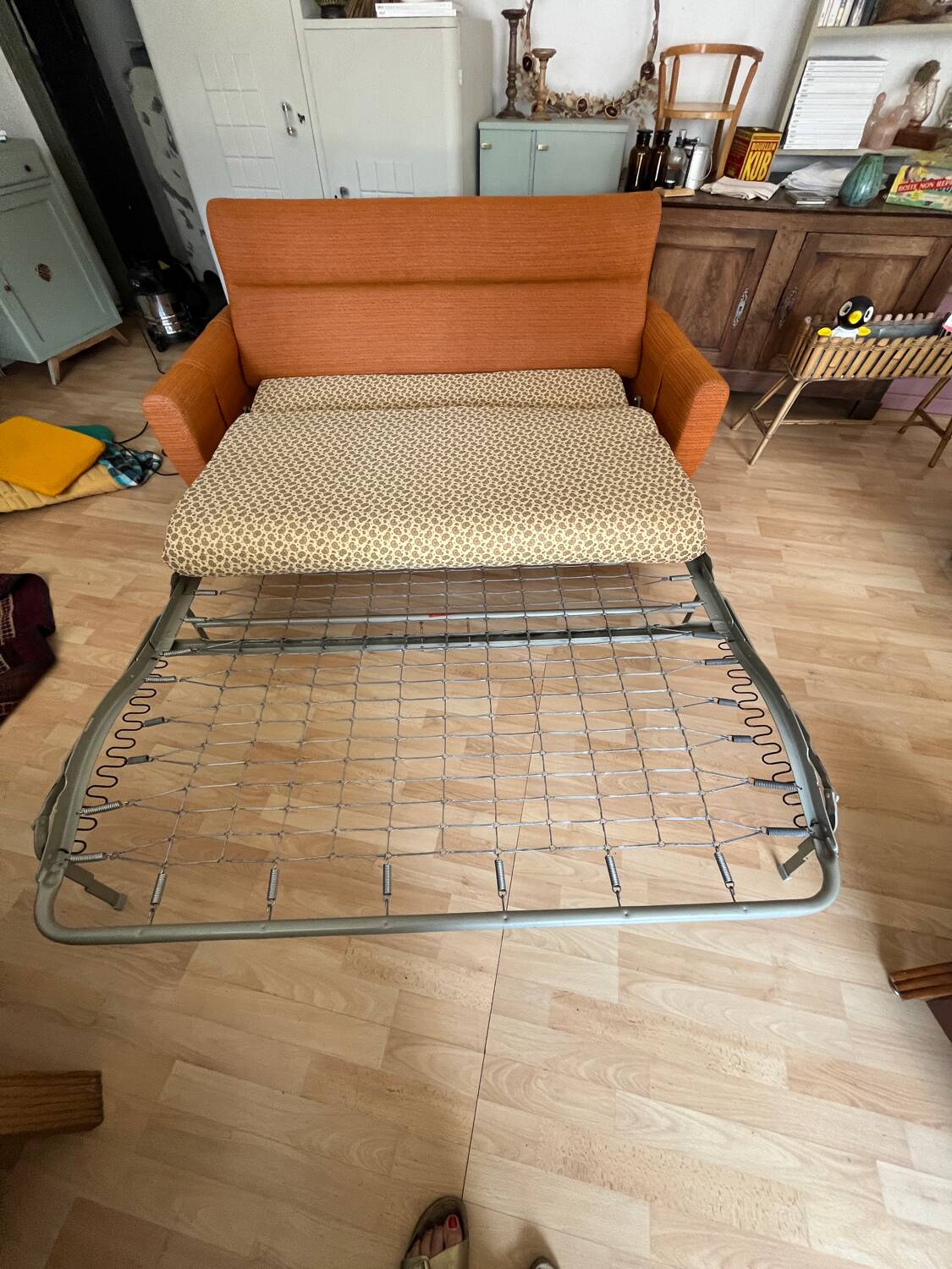 Vintage orange convertible sofa