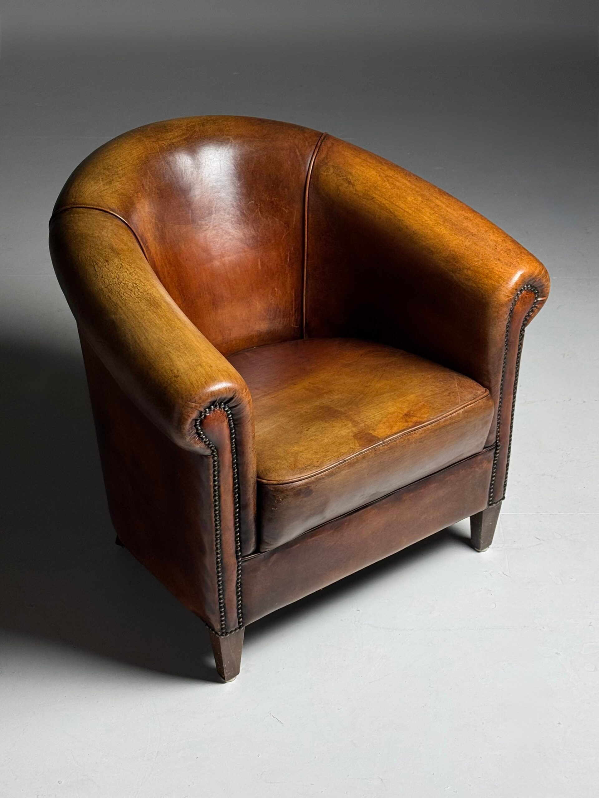 Fauteuil club en peau de mouton 2x classique