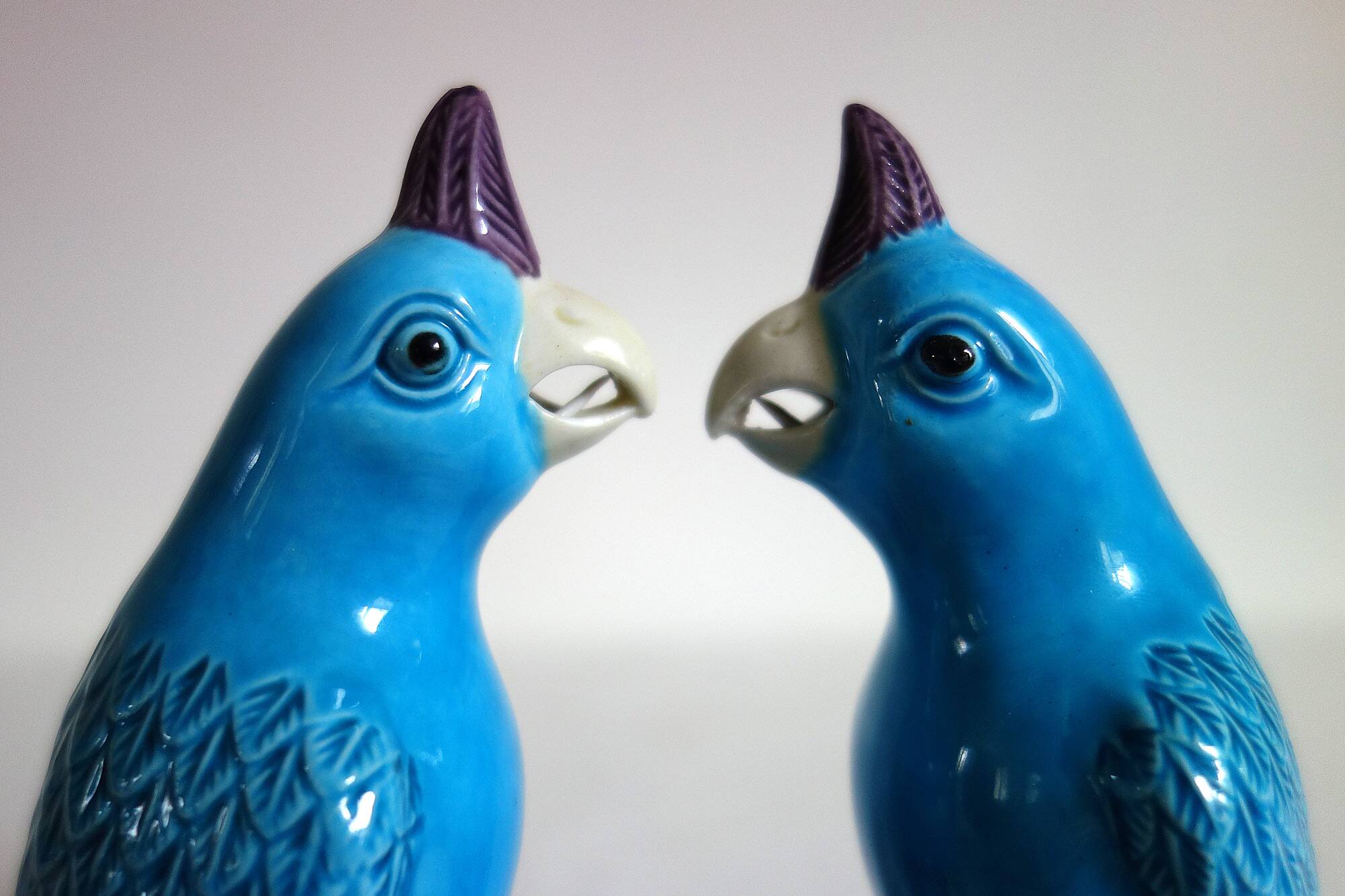 Pair of enamelled porcelain parrots, Chinese, 1960s.