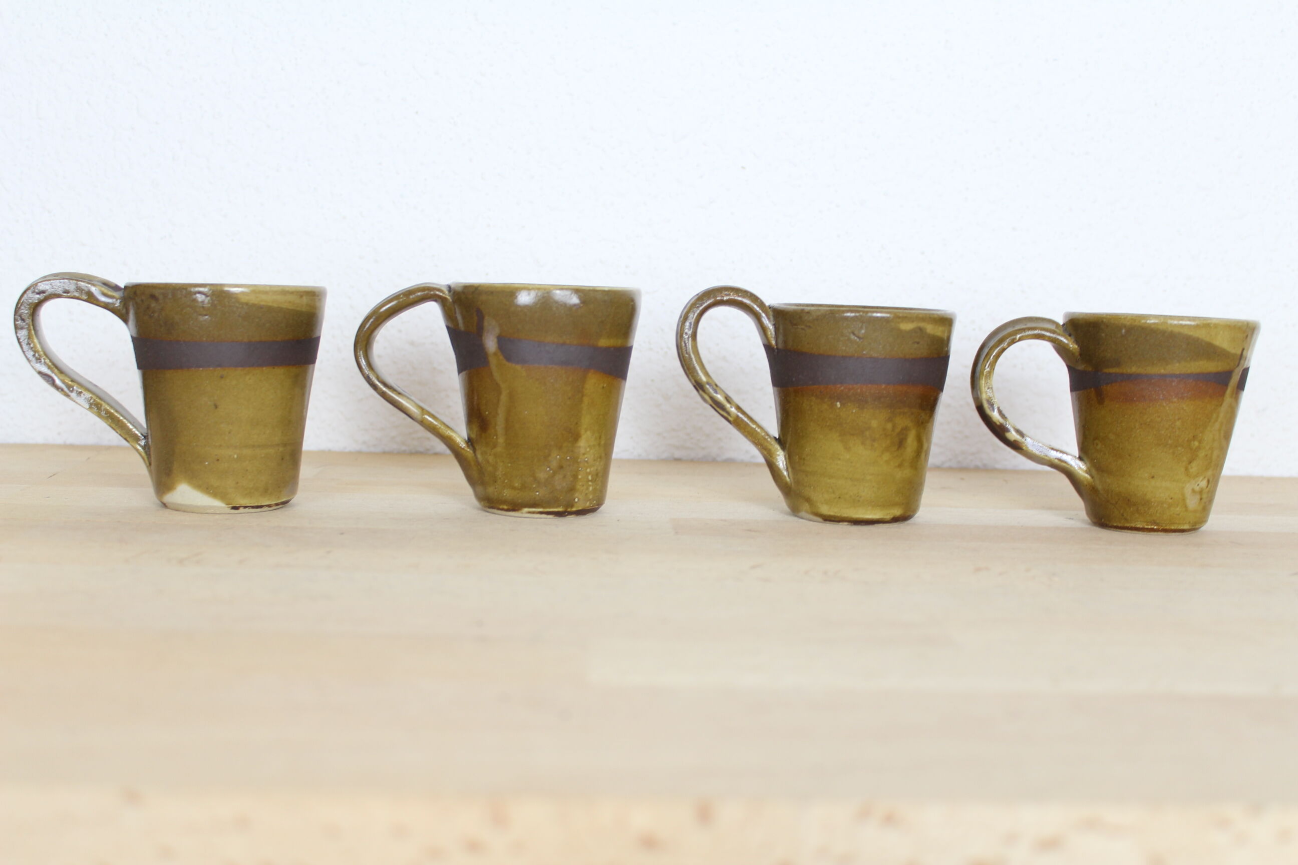 4-cup green and black ceramic set