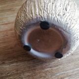 Small asymmetrical golden seed-shaped vase