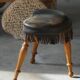 Danish oak tripod stool from the early 20th century with leather fringe, 1930s.