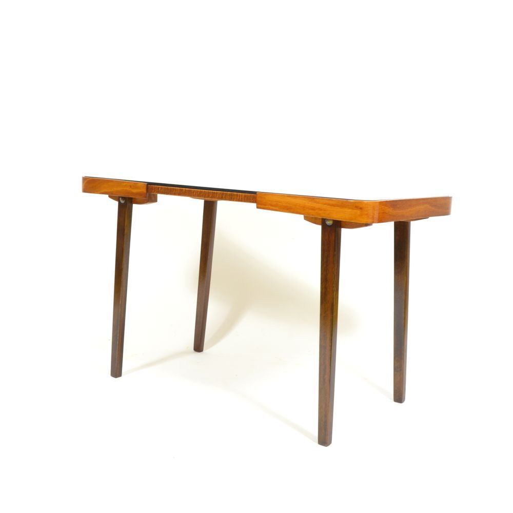 With 70 years black glass coffee table