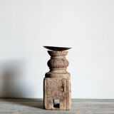 Candle holder in light carved wood