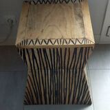 Tabouret coffre en teck naturel brun et noir.