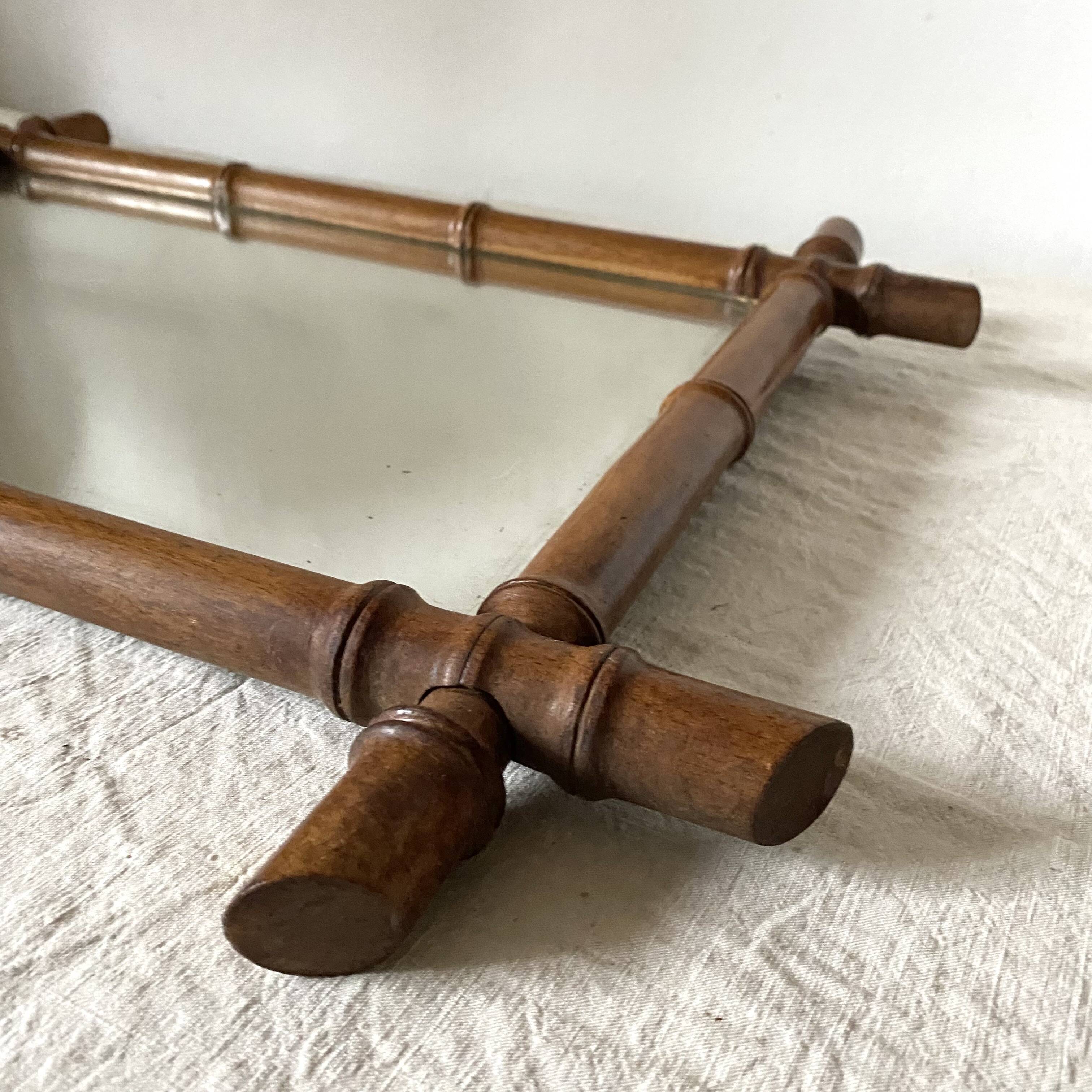 Antique wooden mirror turned bamboo style