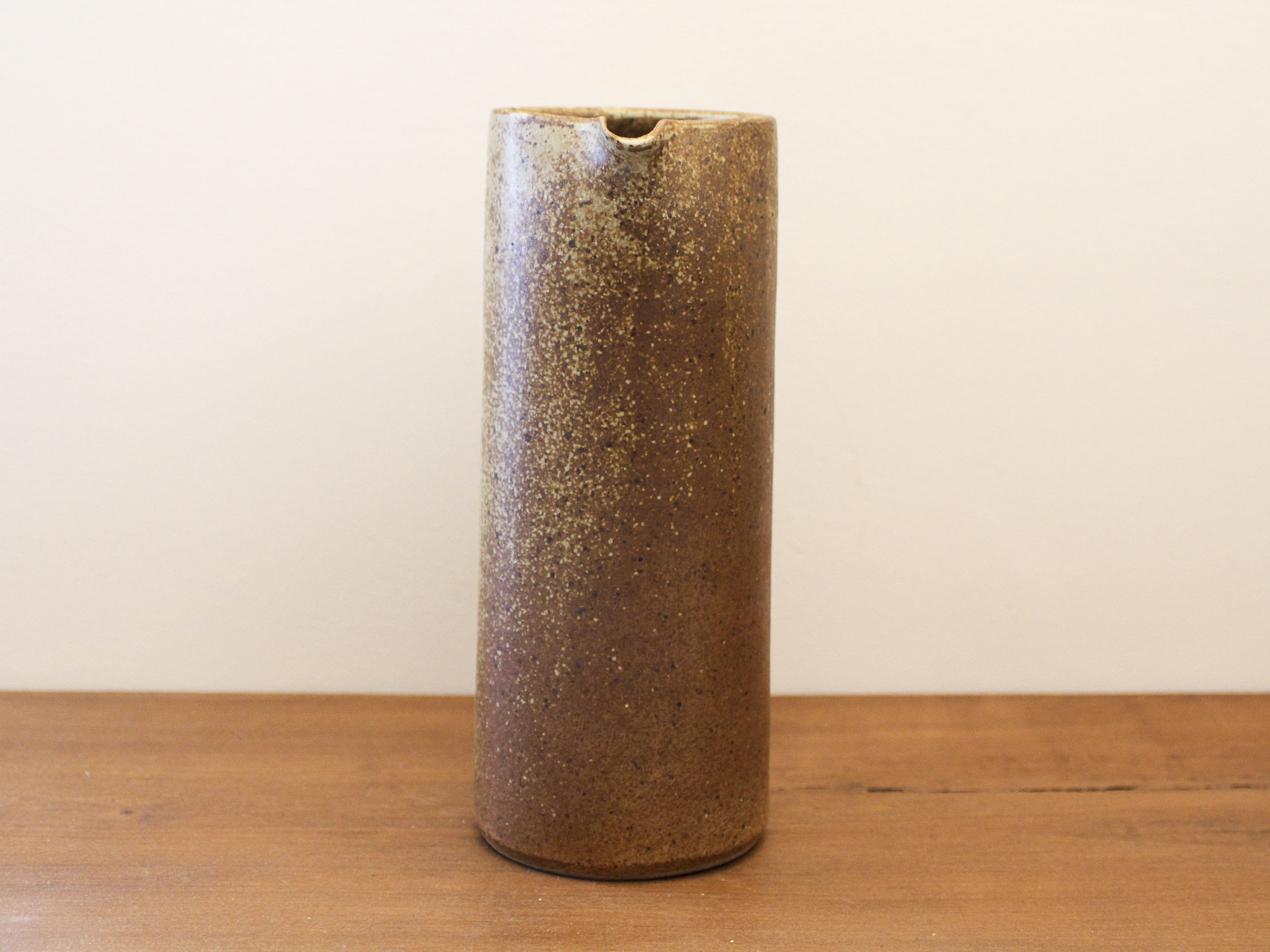 Pitcher in sandstone pyrity signed