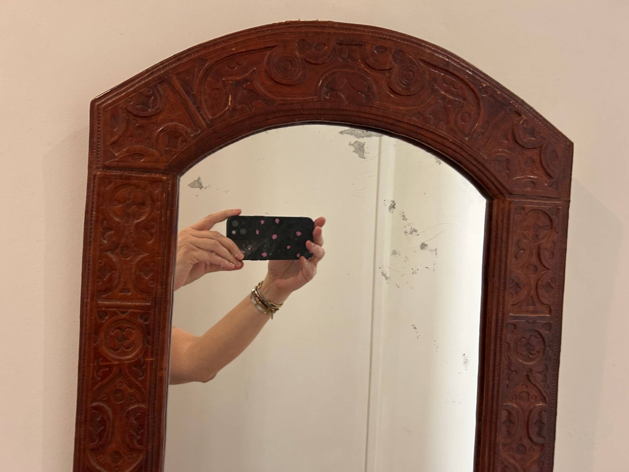 leather repoussé mirror from the 1970s