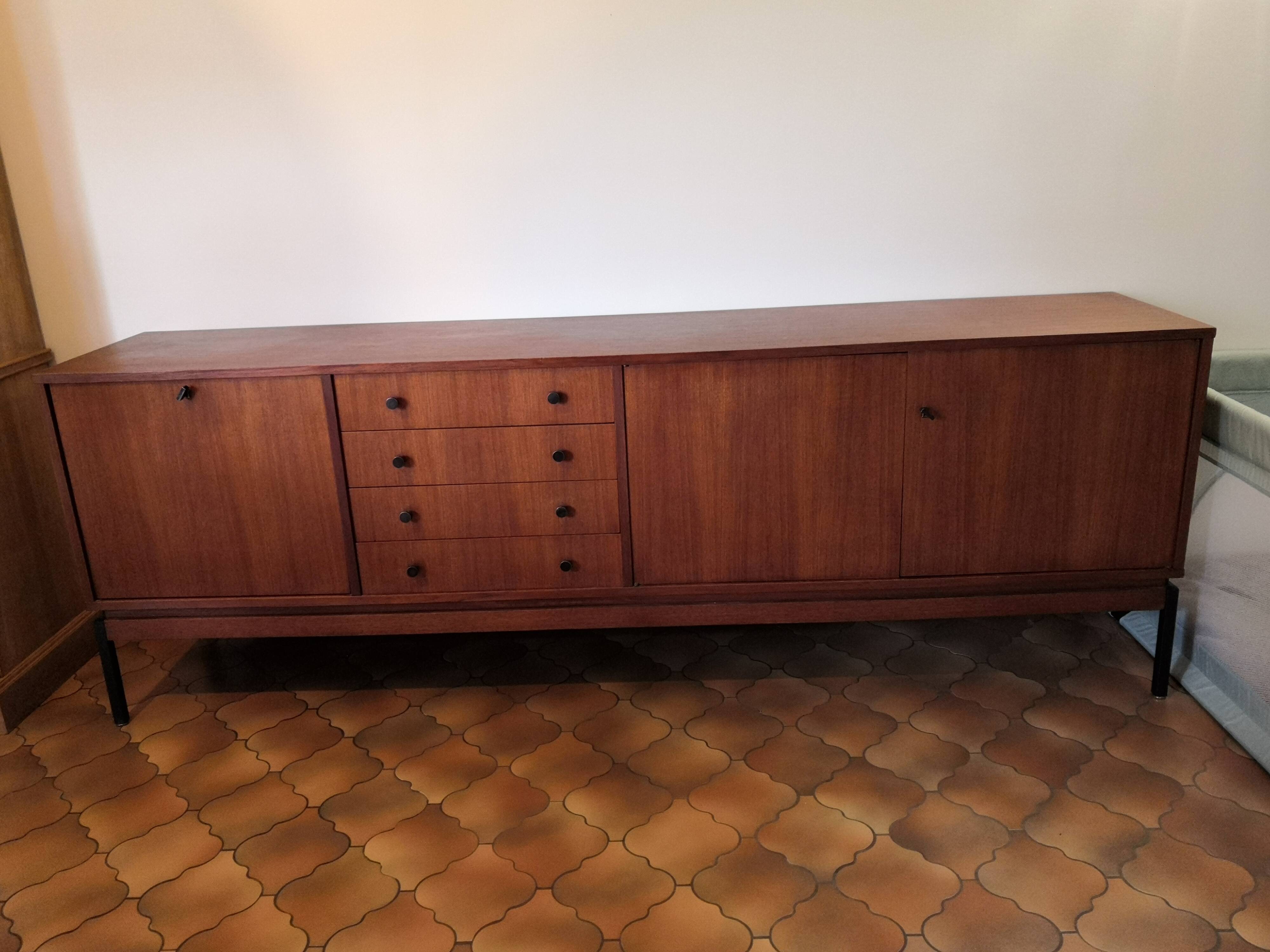 Vintage teak row with metal legs