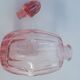 Pink molded glass bottle