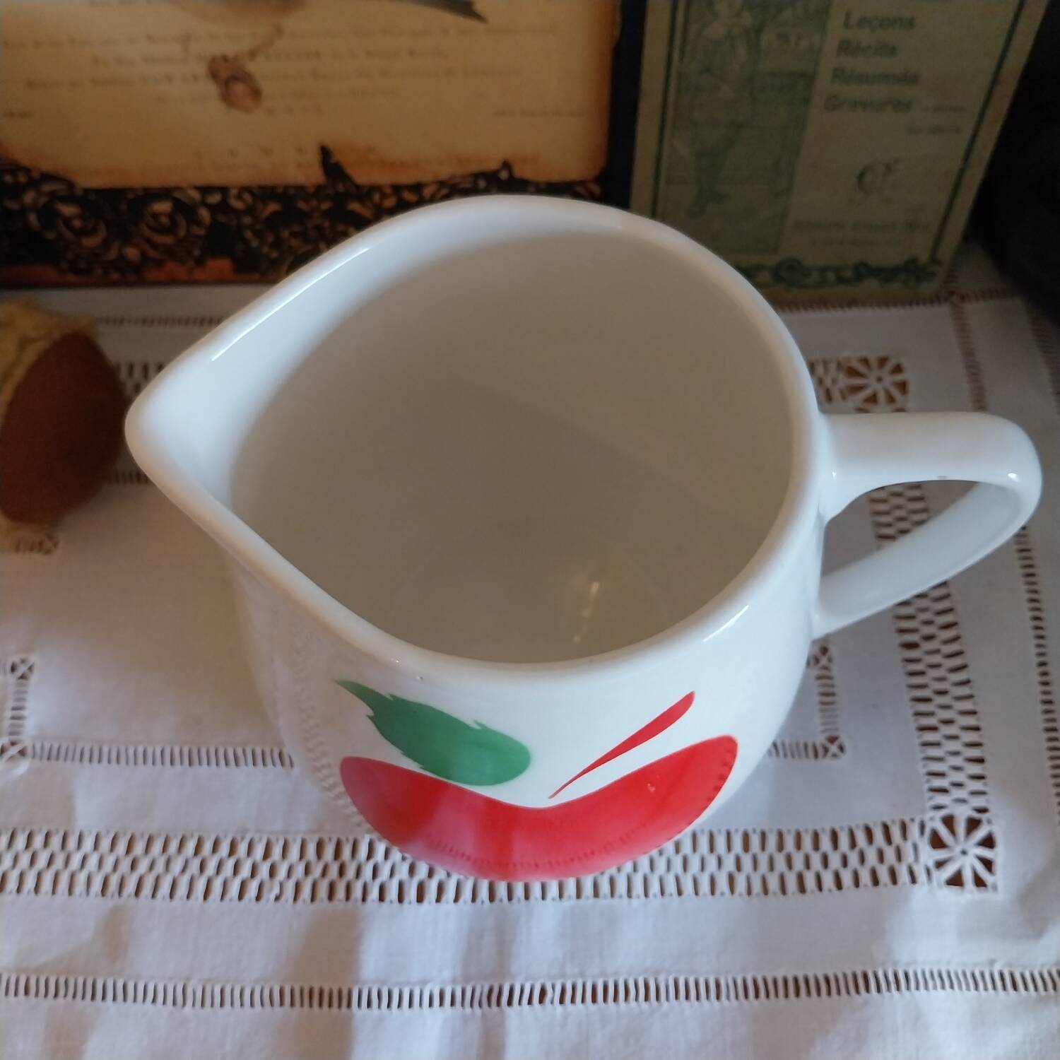 Vintage ceramic carafe with apple decor