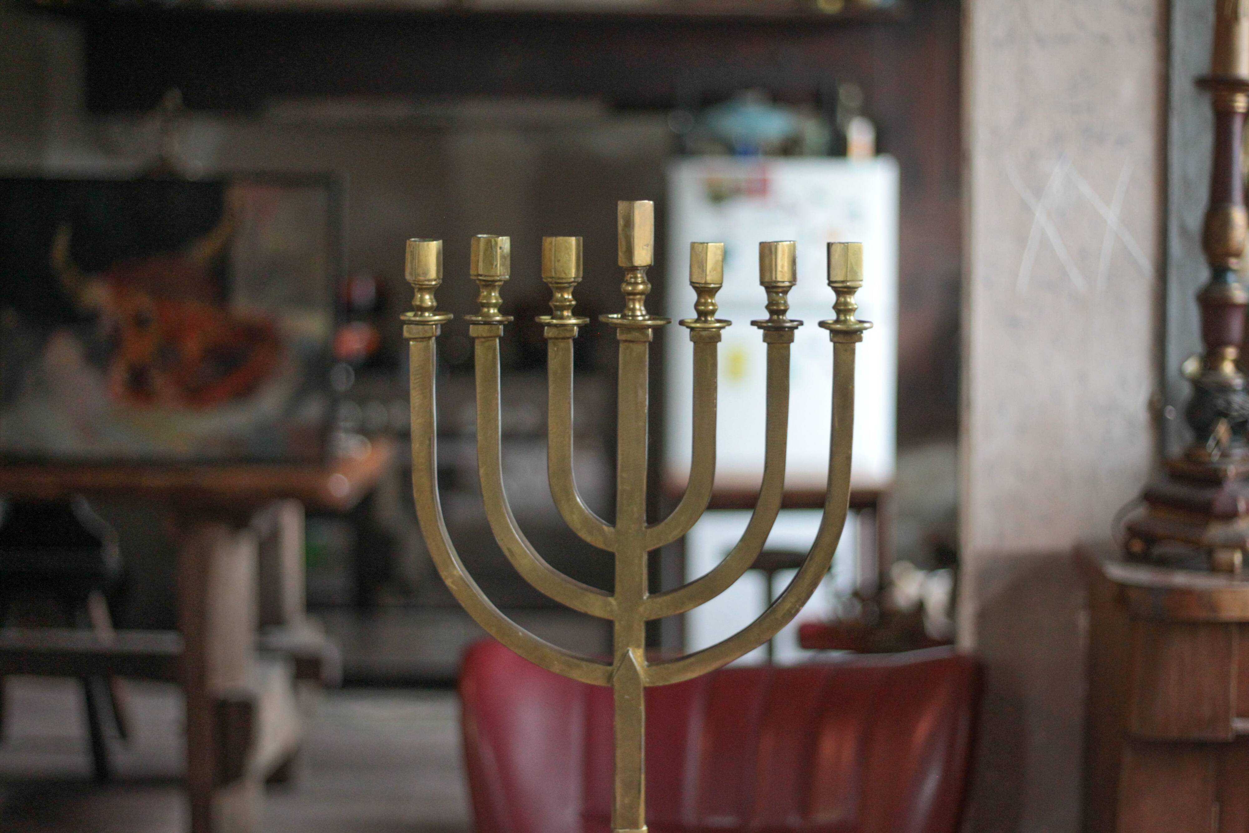 Golden bronze chandelier with seven arms, Menorah, candlestick on a stand, candelabrum.