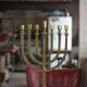 Golden bronze chandelier with seven arms, Menorah, candlestick on a stand, candelabrum.