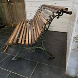 Old cast iron garden bench with oak slats