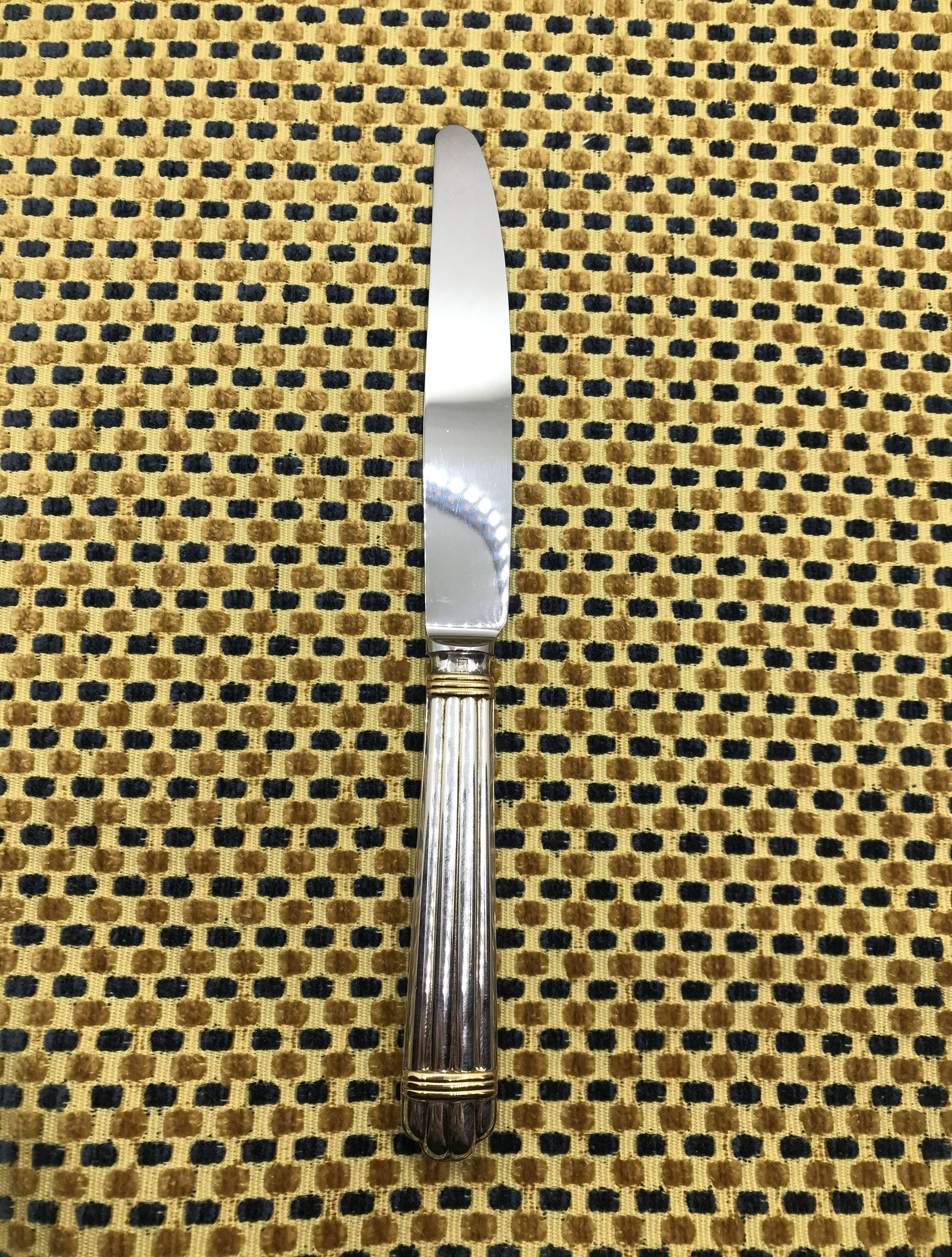 Small silver-plated Christofle knife, Aria model with gold rings
